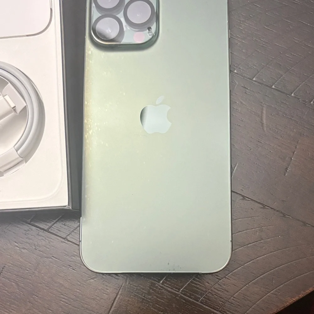 Apple Smartphone with White Charging Cable